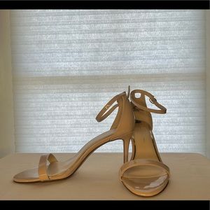 Nude patent leather heels